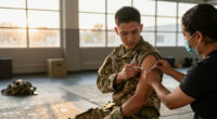 US military requires flu vaccine for some after outbreak in Texas training center